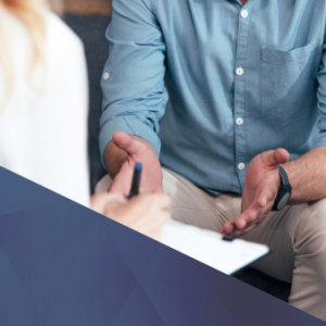 Cover of a brochure titled Medications for opioid use disorder showing a smiling man talking and gesturing with his hands to someone whose back is to the camera, looks like a therapy session or consultation with a provider