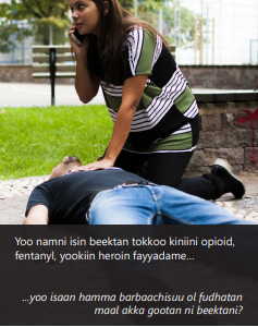 Brochure cover showing a woman kneeling on the ground next to an unconscious man. One of her hands is resting on his chest, the other holding a phone to her ear. Title is Opioid Overdose (in Oromo).