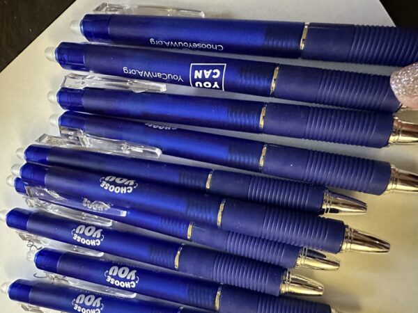 Stack of blue Choose You/ You Can erasable pens